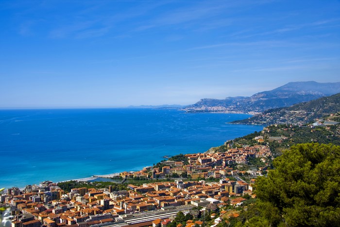 Coastal town with red roofs overlooking the Mediterranean Sea