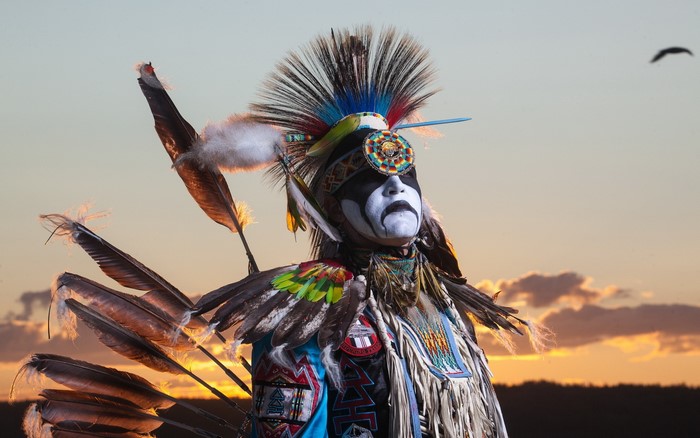 Man in Native American Regalia with Feathers