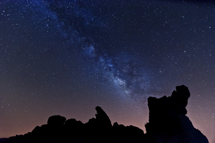 Milky Way over rocky silhouette