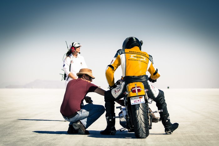 Motorcyclist on Bonneville Salt Flats with crew