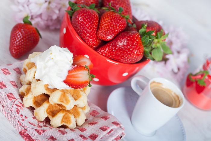 Waffles with Strawberries and Cream and Coffee