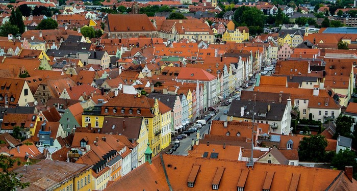Aerial view of a European town with red-tiled roofs