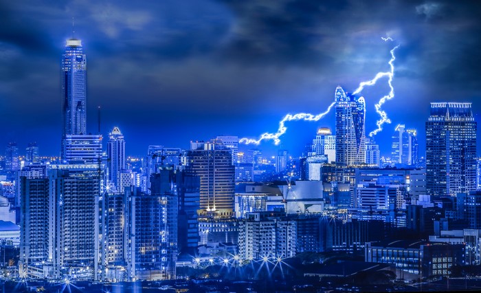 Bangkok Cityscape with Lightning Strike at Night