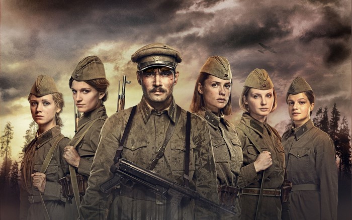 Soviet soldiers in uniform with weapons