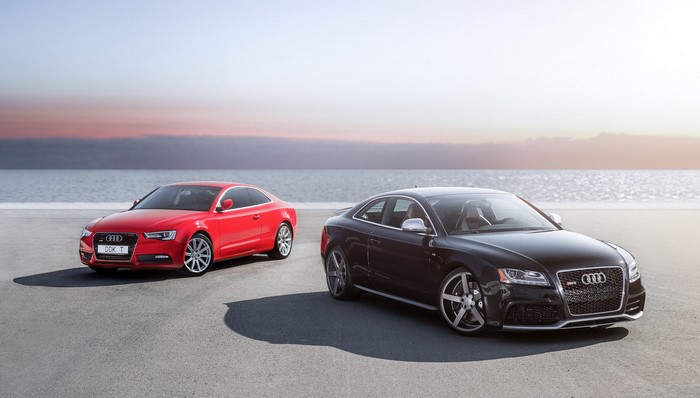 Two Audi RS5 cars on a beach