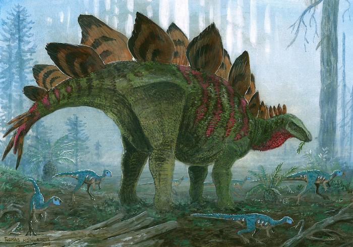 Stegosaurus and small dinosaurs in a prehistoric forest