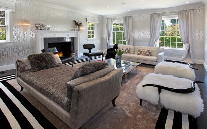 Luxurious living room with fireplace and modern furniture