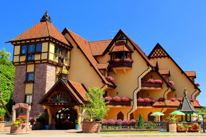 Alsace France Hotel with Flowers and Blue Sky
