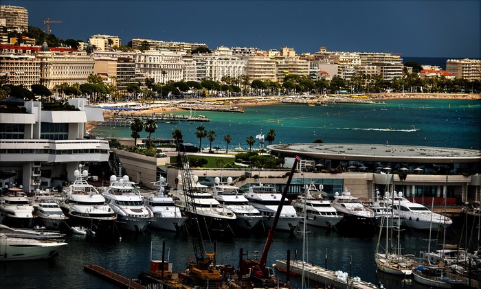 Yachts docked in a marina in Cannes, France