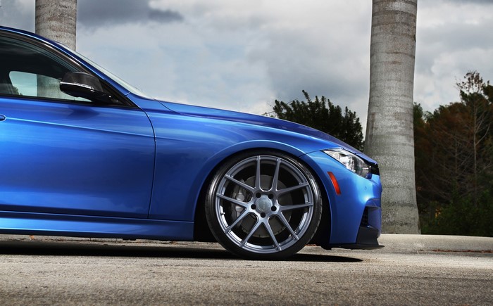 Blue BMW M3 with custom wheels