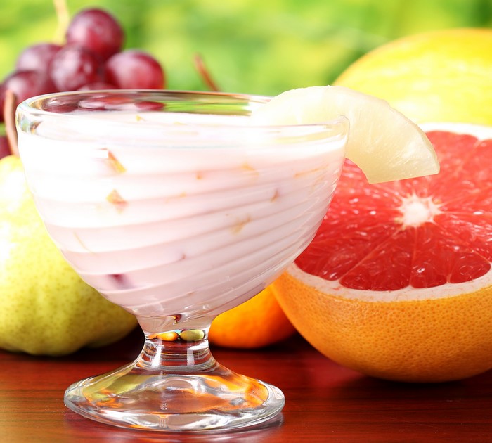 Fruit cocktail in a glass with fruits