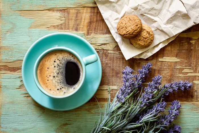 Coffee cup with cookies and lavender