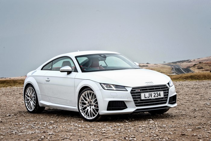 White Audi TTS Coupe on a dirt road