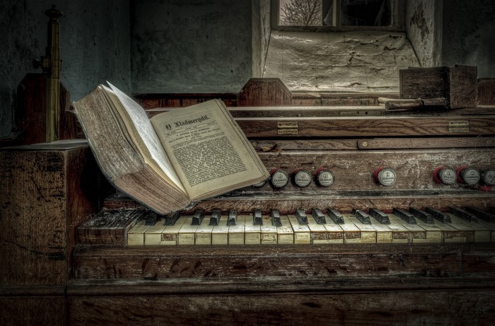 Old Pipe Organ with Open Book