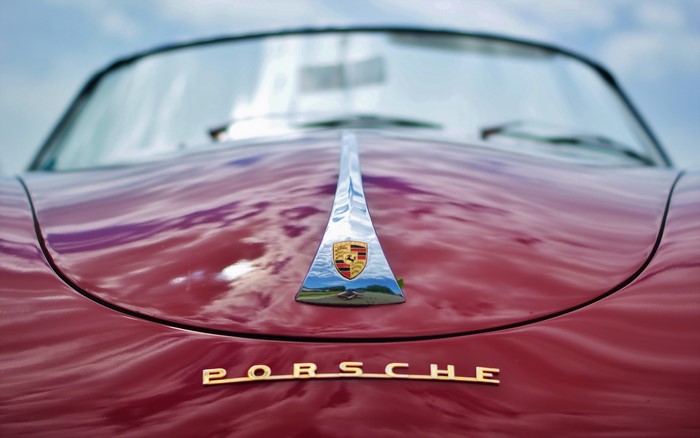 Red Porsche with Emblem and Name
