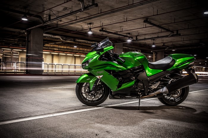 Green Kawasaki Ninja Motorcycle in Parking Garage