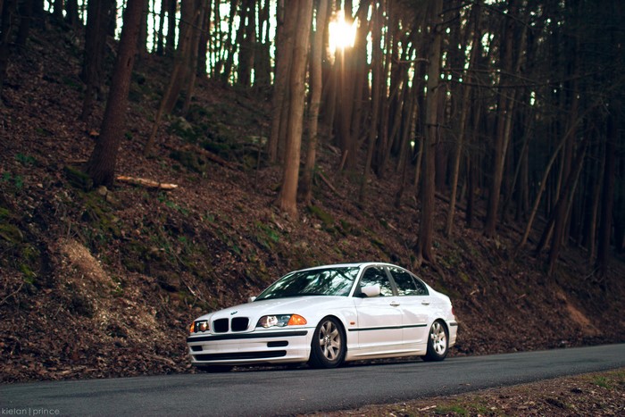 White BMW E46 323i in a Forest