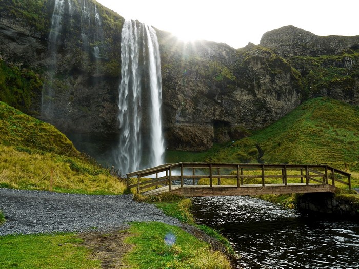 Seljalandsfoss Waterfall with Wooden Bridge in Iceland