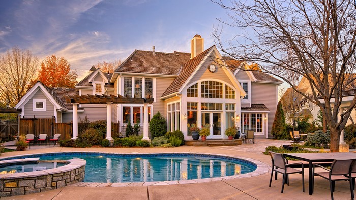 Luxury house with swimming pool and outdoor dining area