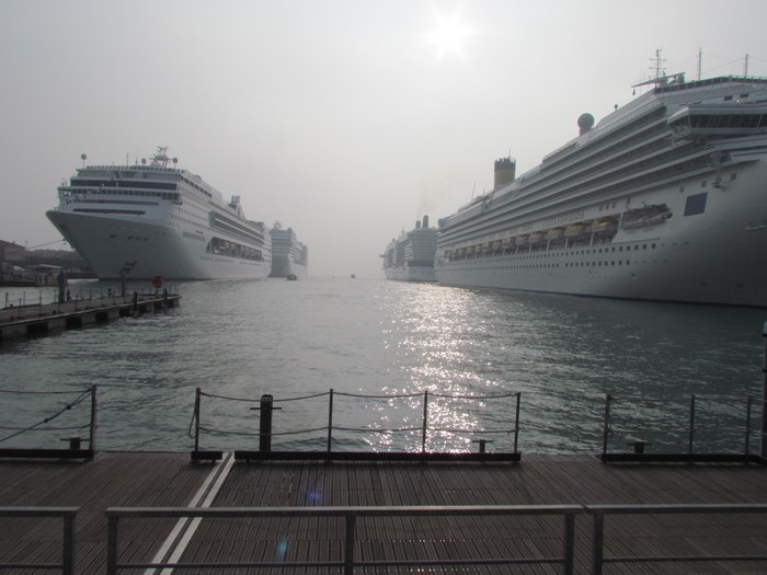 Cruise liners in a foggy marina