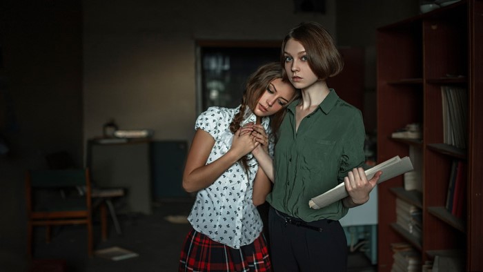 Two young women in a room