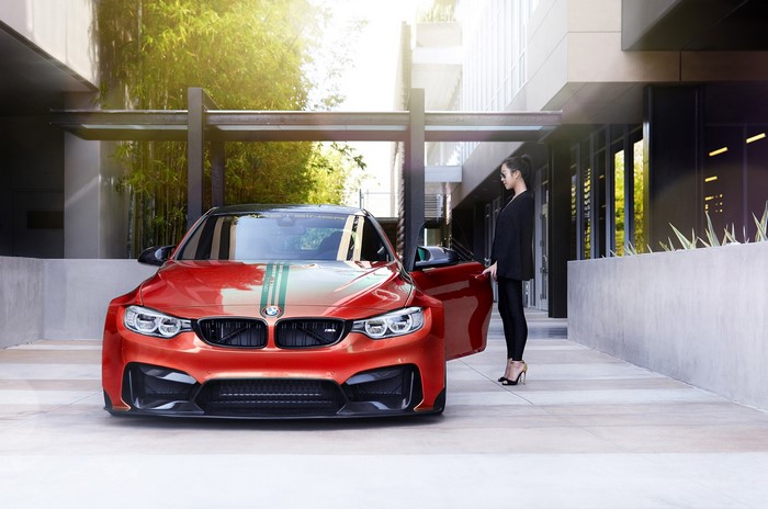 Red BMW M4 Vorsteiner GTRS4 with racing stripes