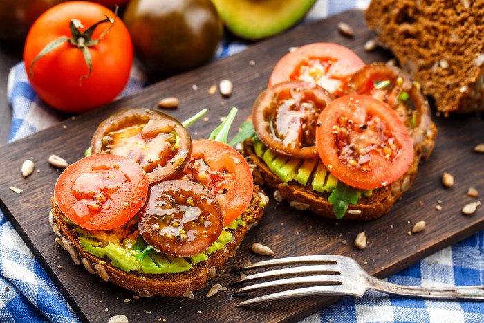 Avocado and Tomato Toast with Sunflower Seeds