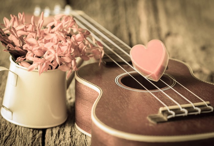 Heart-Shaped Object on Acoustic Guitar 4K