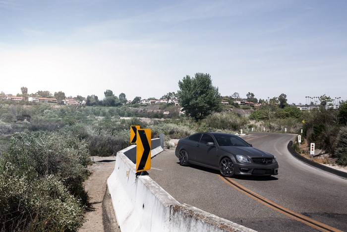 Mercedes-Benz C63 AMG Coupe on a Winding Road