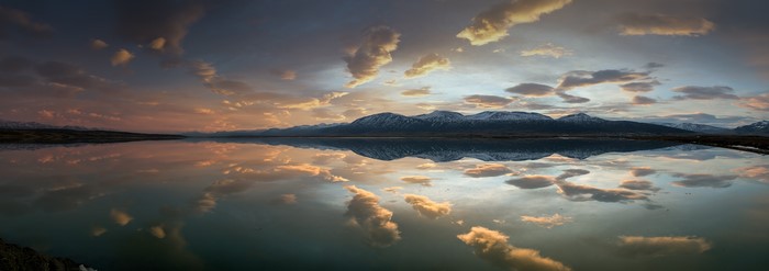 Lake and Mountains Reflection at Sunset
