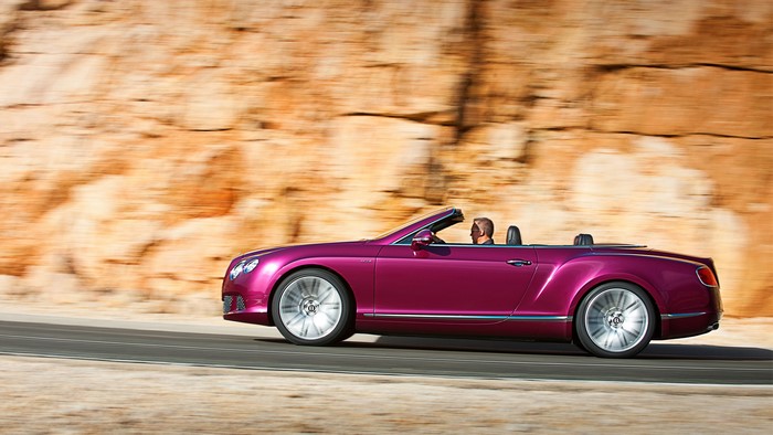 Bentley Continental GTC Cabriolet driving on a road
