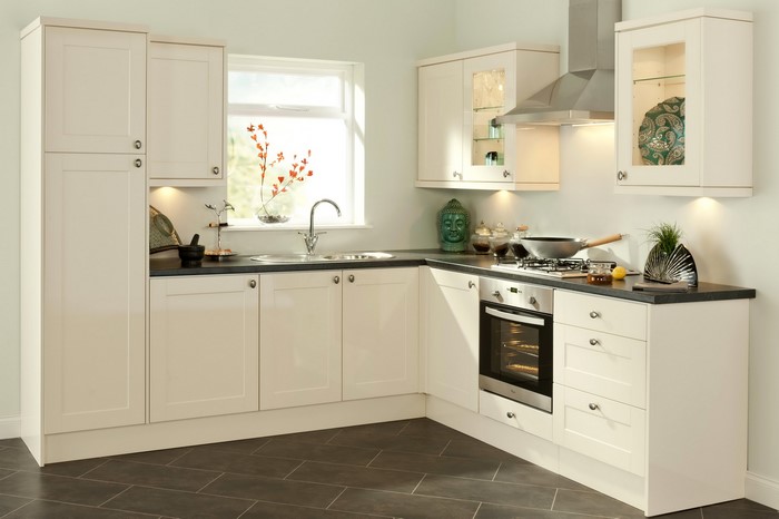Modern cream kitchen with stainless steel appliances