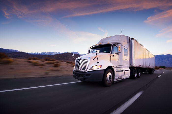 White International Truck on a Desert Road