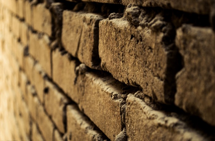 Close-up of a textured brick wall