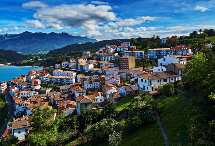 Coastal town of Colunga, Asturias, Spain with mountains and sea