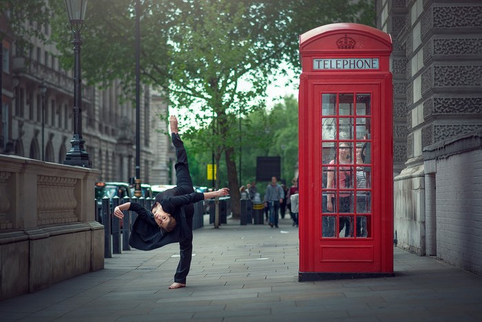 Marine Fauvet dancing by London telephone booth
