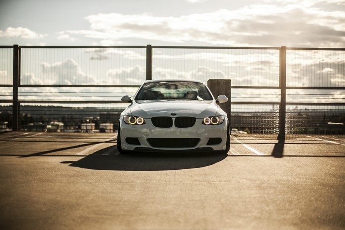 White BMW M3 E92 parked on rooftop