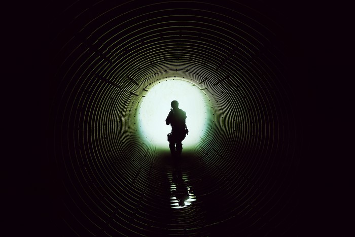 Soldier in a dark tunnel