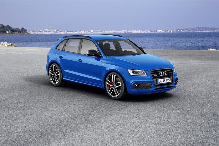 Blue Audi SQ5 TDI plus parked by the sea