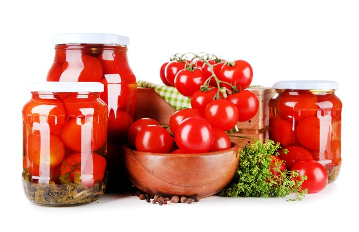 Preserved Tomatoes in Jars with Fresh Tomatoes and Dill