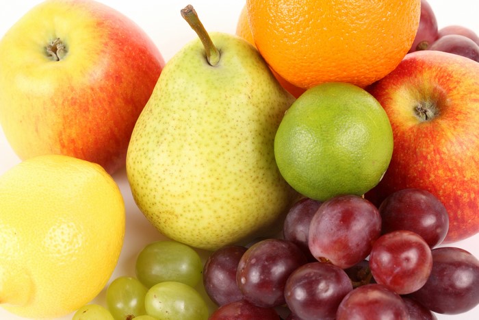 Assortment of Fruits: Apples, Pears, Grapes, Lemon, Orange, and Lime