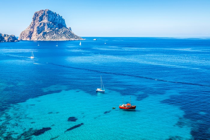 4K Ibiza Spain Sea Scenery with Crag and Boats
