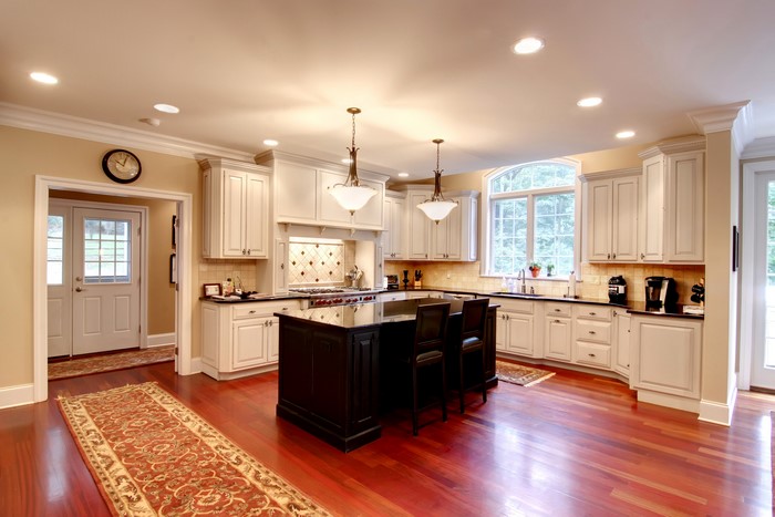 Kitchen with island and chandelier