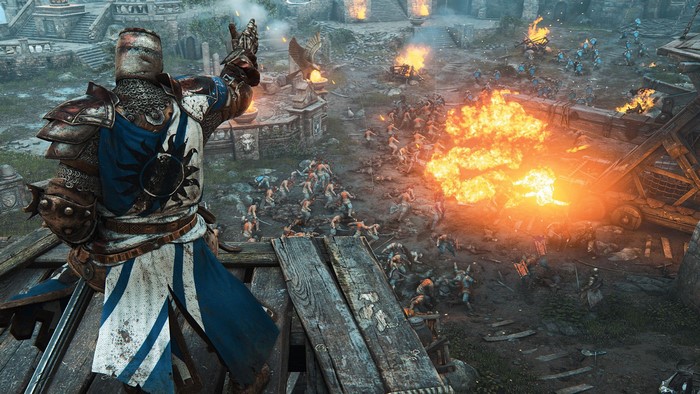 Knight from For Honor in battle with fire and soldiers