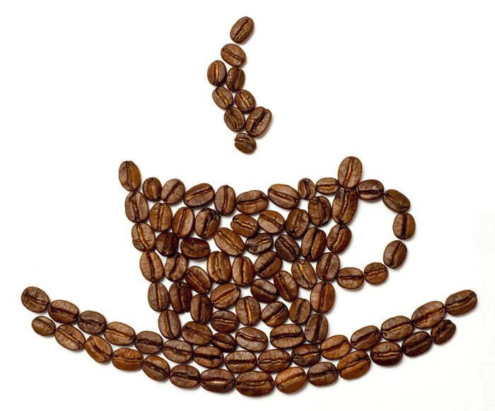 Coffee beans arranged in a cup and saucer shape