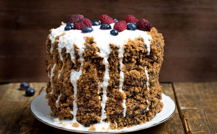 Chocolate cake with berries and cream