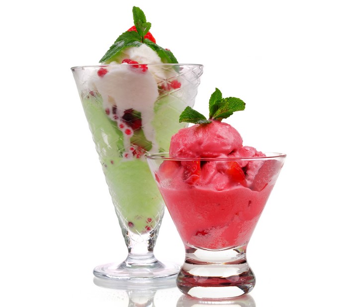 Two ice cream sundaes in glasses