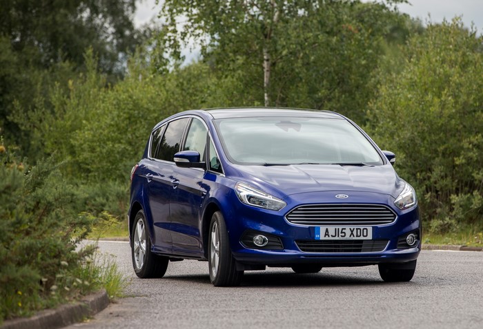 Blue 2015 Ford S-Max driving on a road