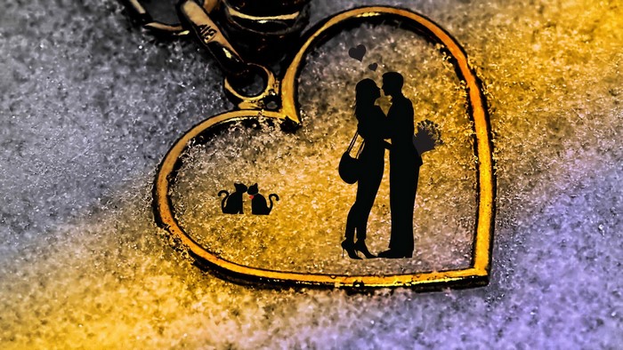 Heart locket with couple and cats silhouette