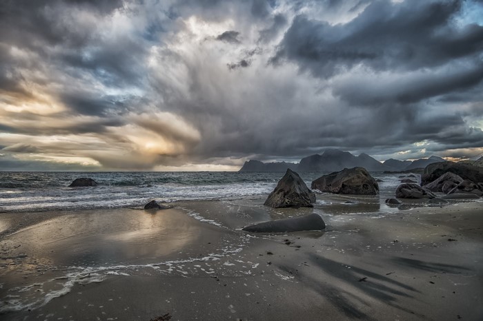 Stormy sky over a rocky beach and sea